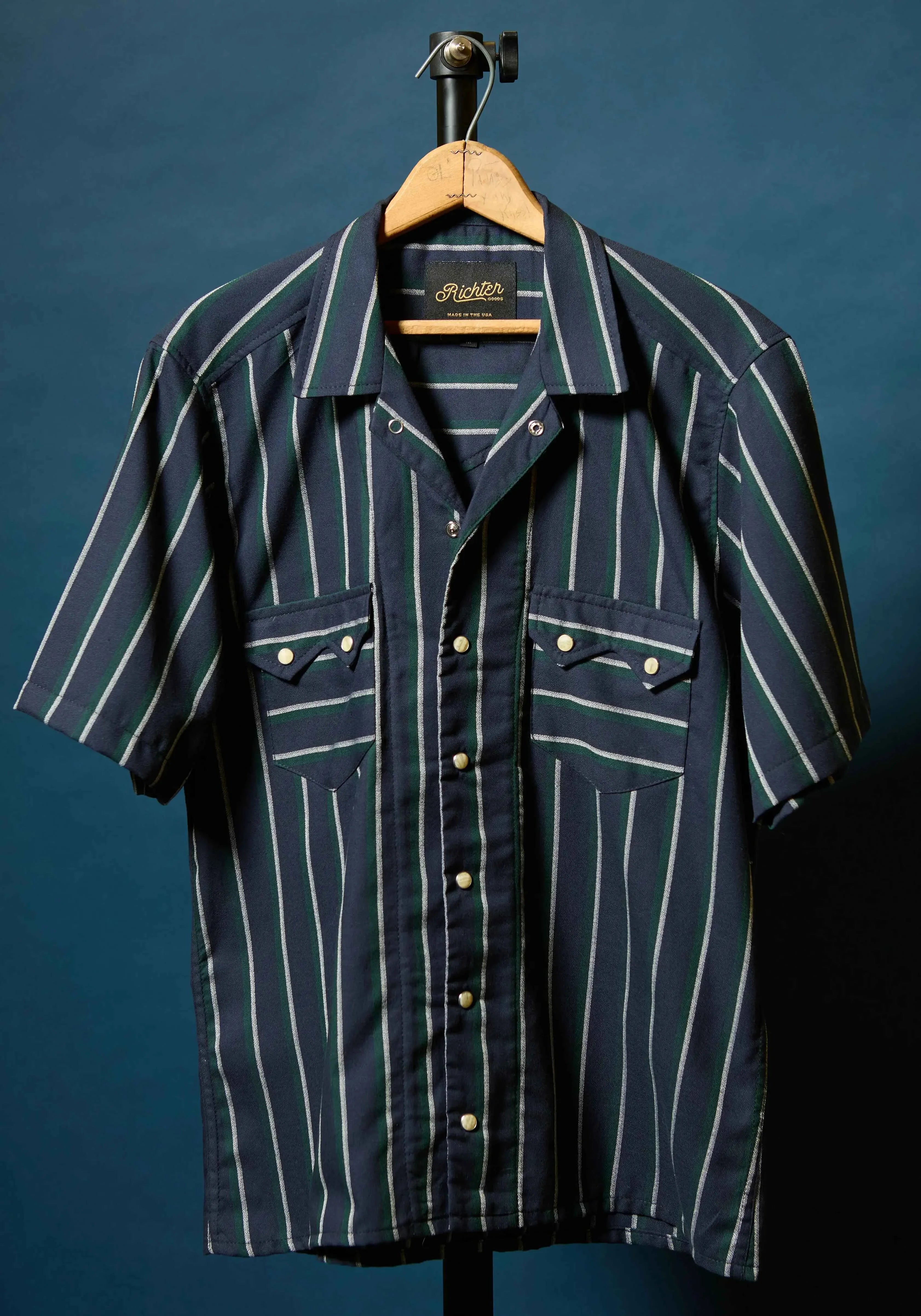 Pony in Navy Blue with Green and White Stripes Front