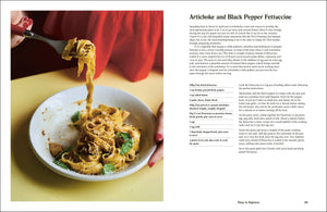 Plate of pasta with a fork, next to a recipe card for Artichoke and Black Pepper Fettuccine.