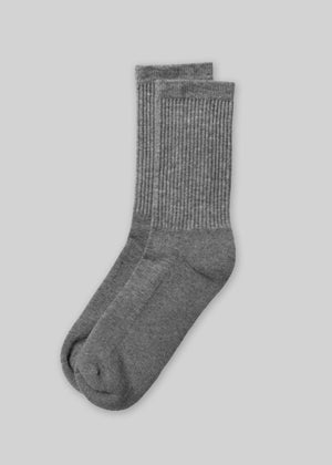 b56f147bd394a43043371e339cdd5a4b035b530fe9ee33228bb13e9ee02d533b front, pair of grey ribbed crew socks on light background