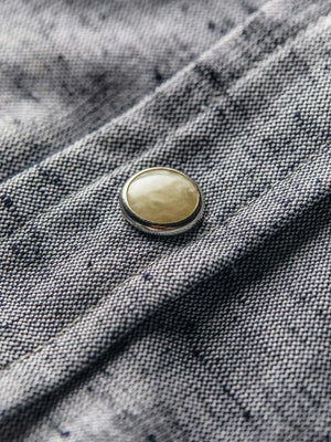 richter-longSleeve front detail with pearl snap button on textured fabric