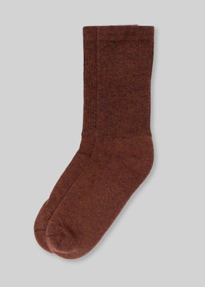3d4ed769d89777b725b47d6332a64fa294967bedce3460715fd2a440781d397b front, brown men's crew socks on gray background