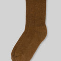 Brown wool crew socks front view on light gray background