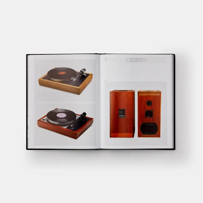 Open book showing images of turntables and speakers on a white background