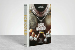 Book titled 'Ice Cold' by Taschen on a gray surface with a white background