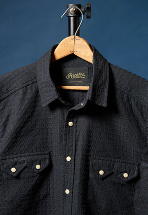 Richter178 front, black textured pearl snap western shirt for men on hanger