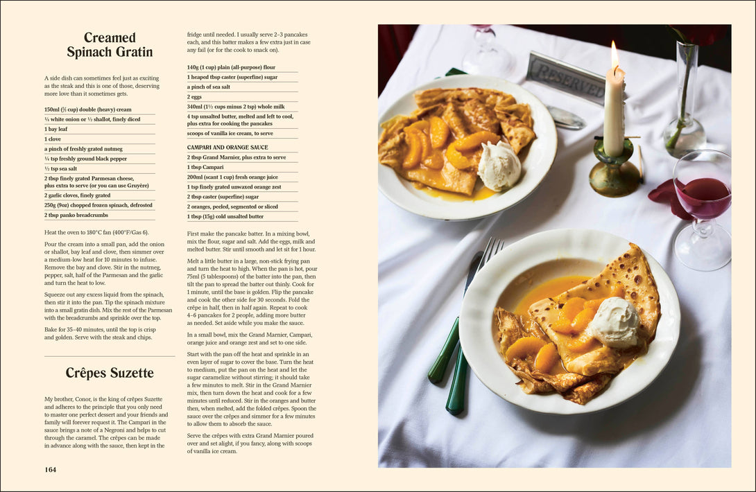 Recipe book page for Creamed Spinach Gratin and Crepes Suzette with a photograph of the dishes on a table.