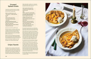 Recipe book page for Creamed Spinach Gratin and Crepes Suzette with a photograph of the dishes on a table.