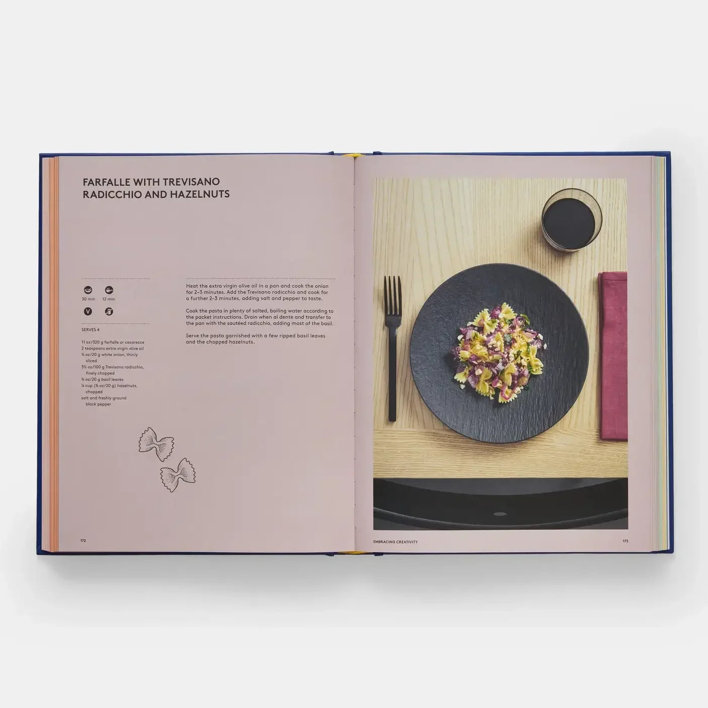 Open cookbook showing a recipe for farfalle with Trevisano, Radicchio, and Hazelnuts.