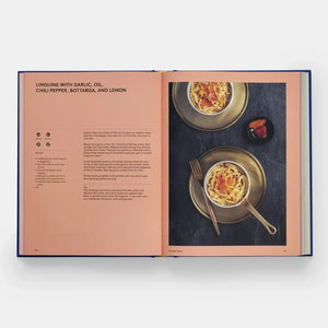 Open cookbook showing a recipe for linguine with garlic, oil, chili pepper, bottarga, and lemon.