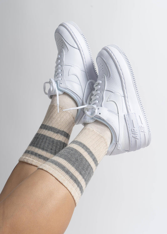 White sneakers worn with striped socks The Mono Stripe: Grey Heather / One Size
