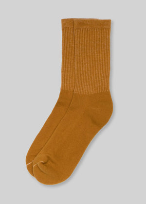 f3c6101aa145e2d570726812c72d1e9f1564d7d675da8a068550a47b79dc20b9 front view of brown ribbed crew socks on white background